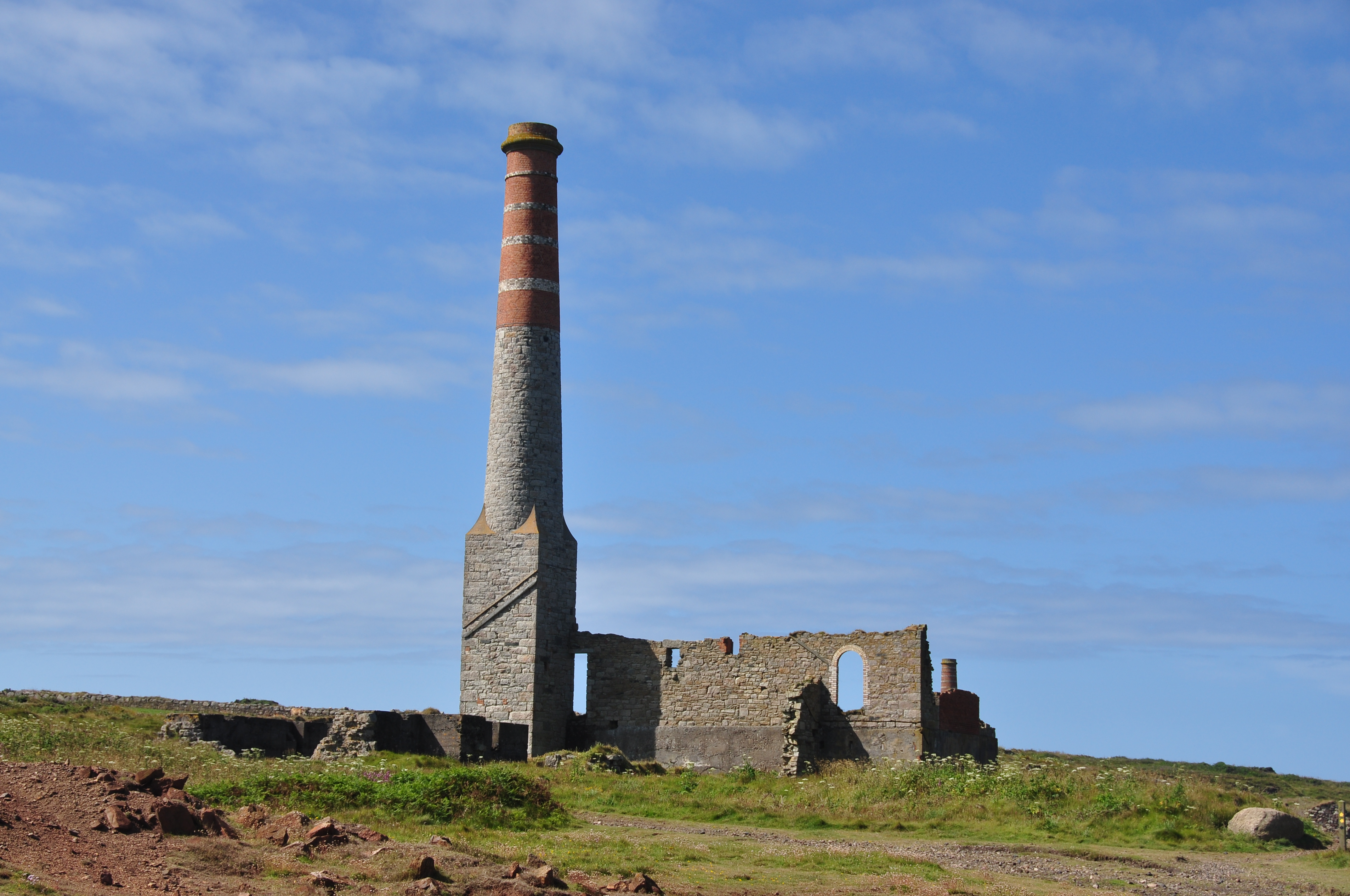 The chimney at Levant Mine against blue sky
