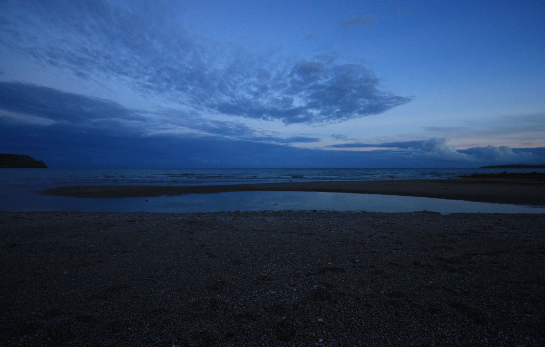 A quiet Cornish beach at blue hour
